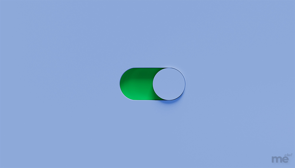 A 3D toggle switch set to the "on" position, revealing a vibrant green interior against a light blue background.